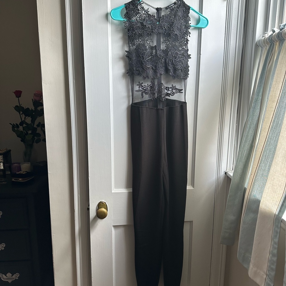 Fashion Nova Black Lace Jumpsuit. Sipper down the back center